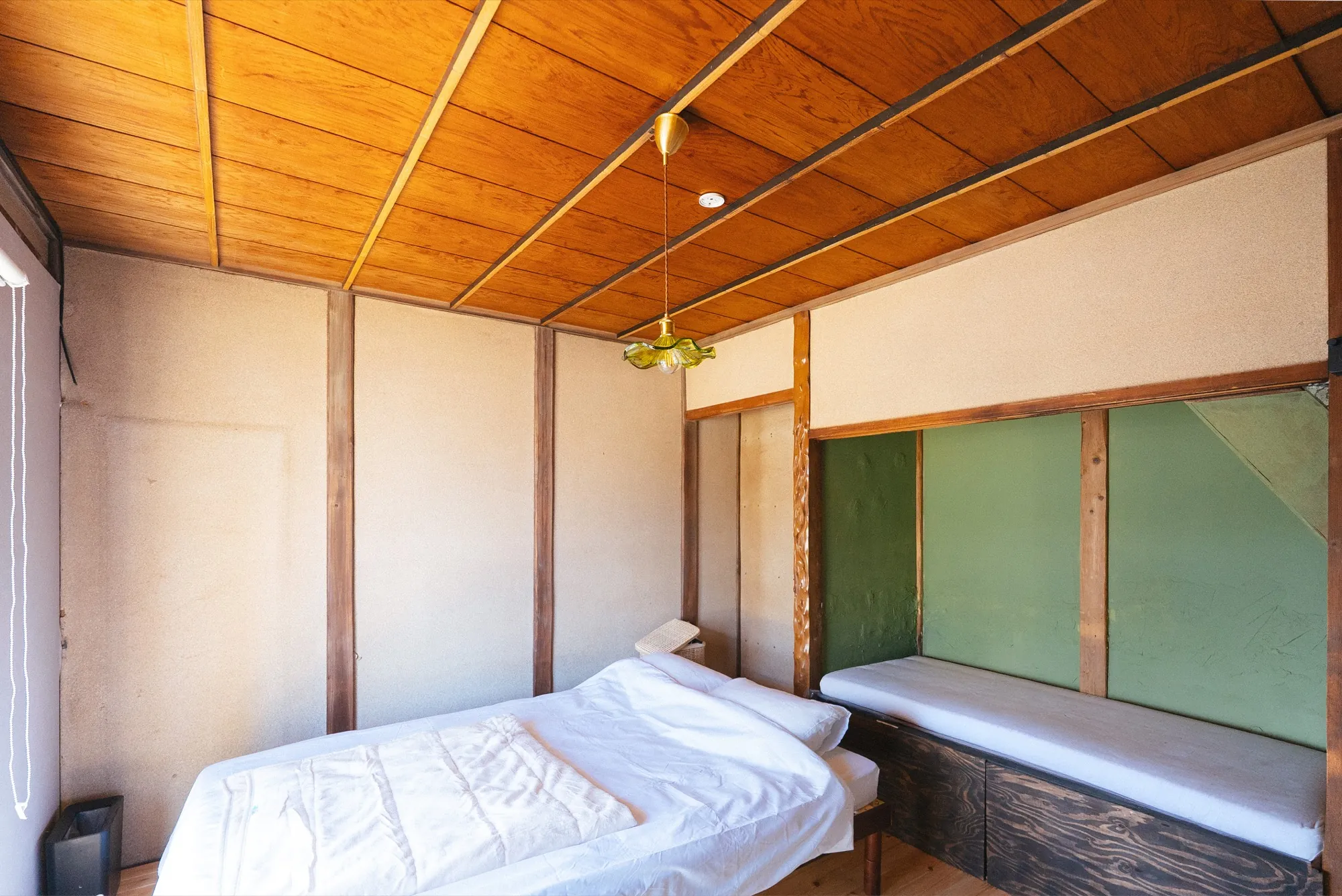 Room A window-side seating and sofa bed